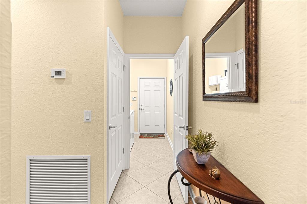 9566 Southwest 70th Loop Ocala, FL 34481 - Photo 5 of 53 a very nice looking room with a potted plant