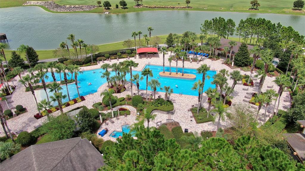 9566 Southwest 70th Loop Ocala, FL 34481 - Photo 53 of 53 an aerial view of a house with a lake view