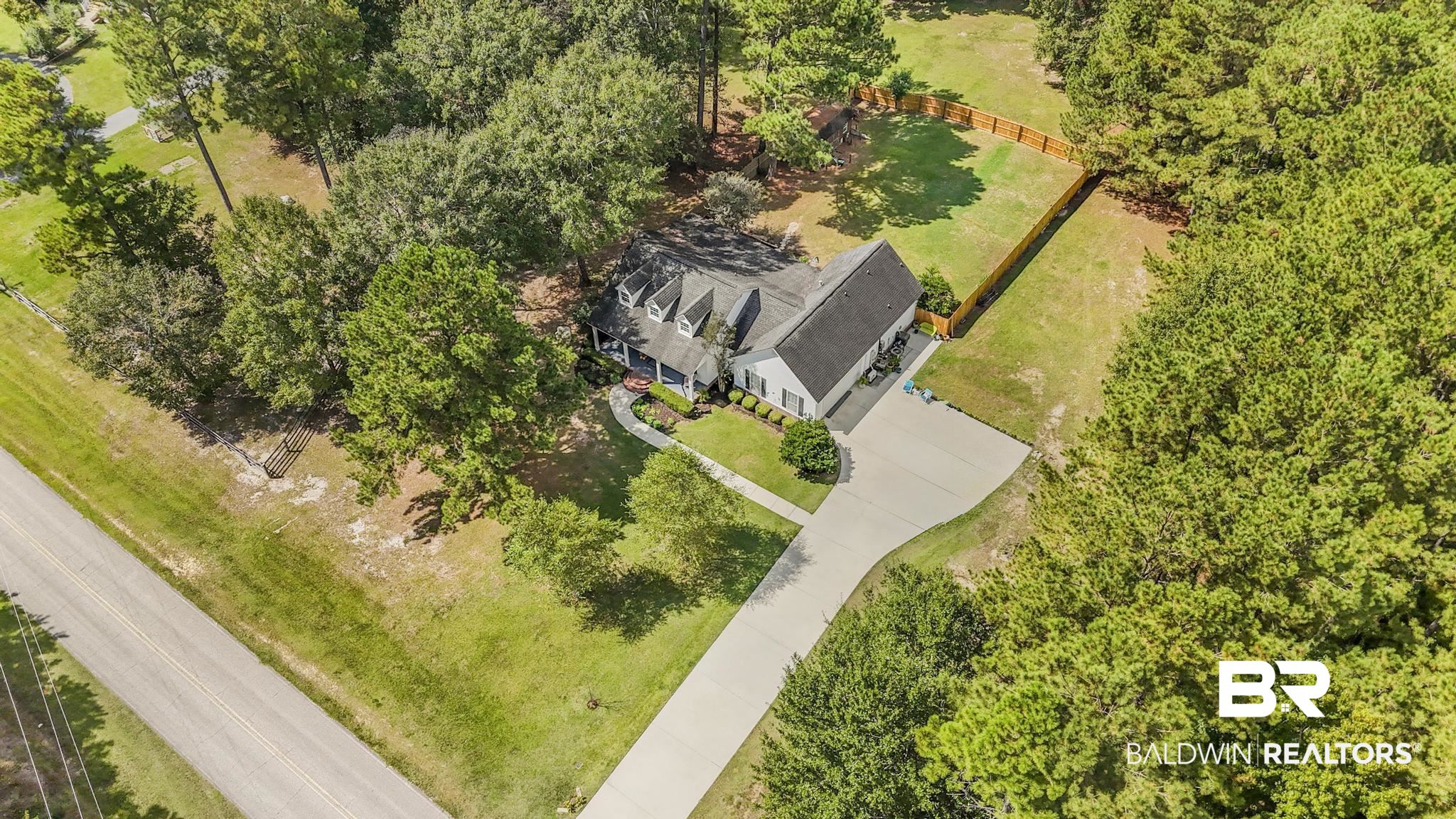 10603 Old Stage Road Stockton, AL 36579 - Photo 29 of 34 View of subject property featuring a tree filled landscape