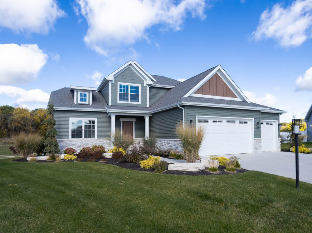 7264 East 115th Avenue Crown Point, IN 46307 - Photo 1 of 42 a front view of house with yard and green space