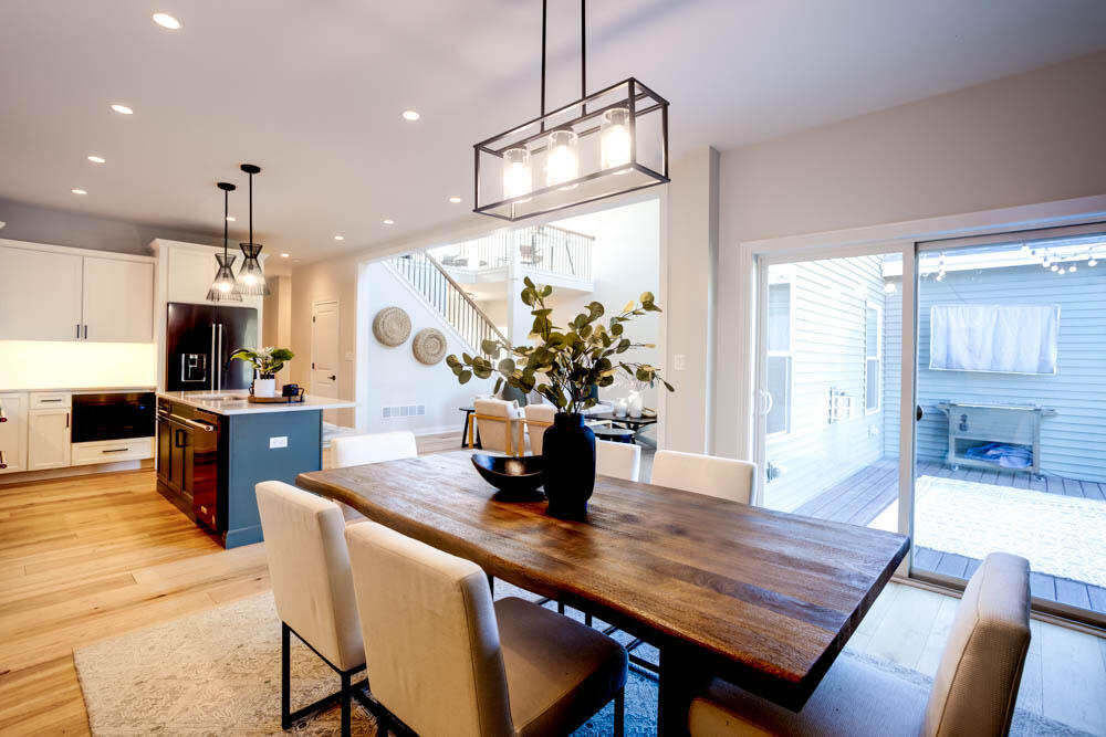 7264 East 115th Avenue Crown Point, IN 46307 - Photo 23 of 42 a kitchen with a table and chairs in it