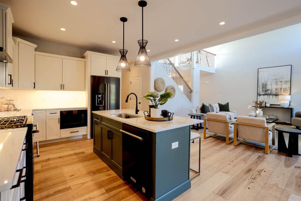 7264 East 115th Avenue Crown Point, IN 46307 - Photo 24 of 42 a kitchen with stainless steel appliances granite countertop a sink and a stove