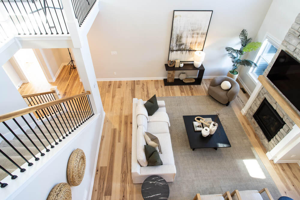 7264 East 115th Avenue Crown Point, IN 46307 - Photo 28 of 42 a living room with furniture and a fireplace
