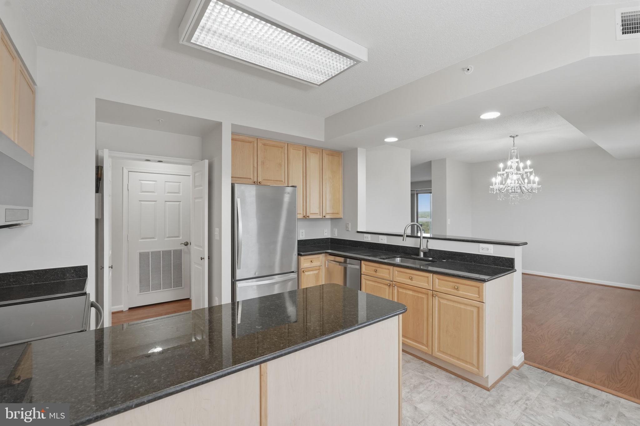 19365 Cypress Ridge Terrace, Unit 907 Leesburg, VA 20176 - Photo 20 of 77 Upgraded kitchen with granite and stainless steel