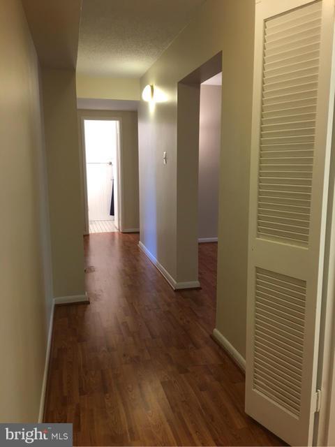 11650 Stoneview Square, Unit 1B Reston, VA 20191 - Photo 4 of 17 Hallway w/new flooring