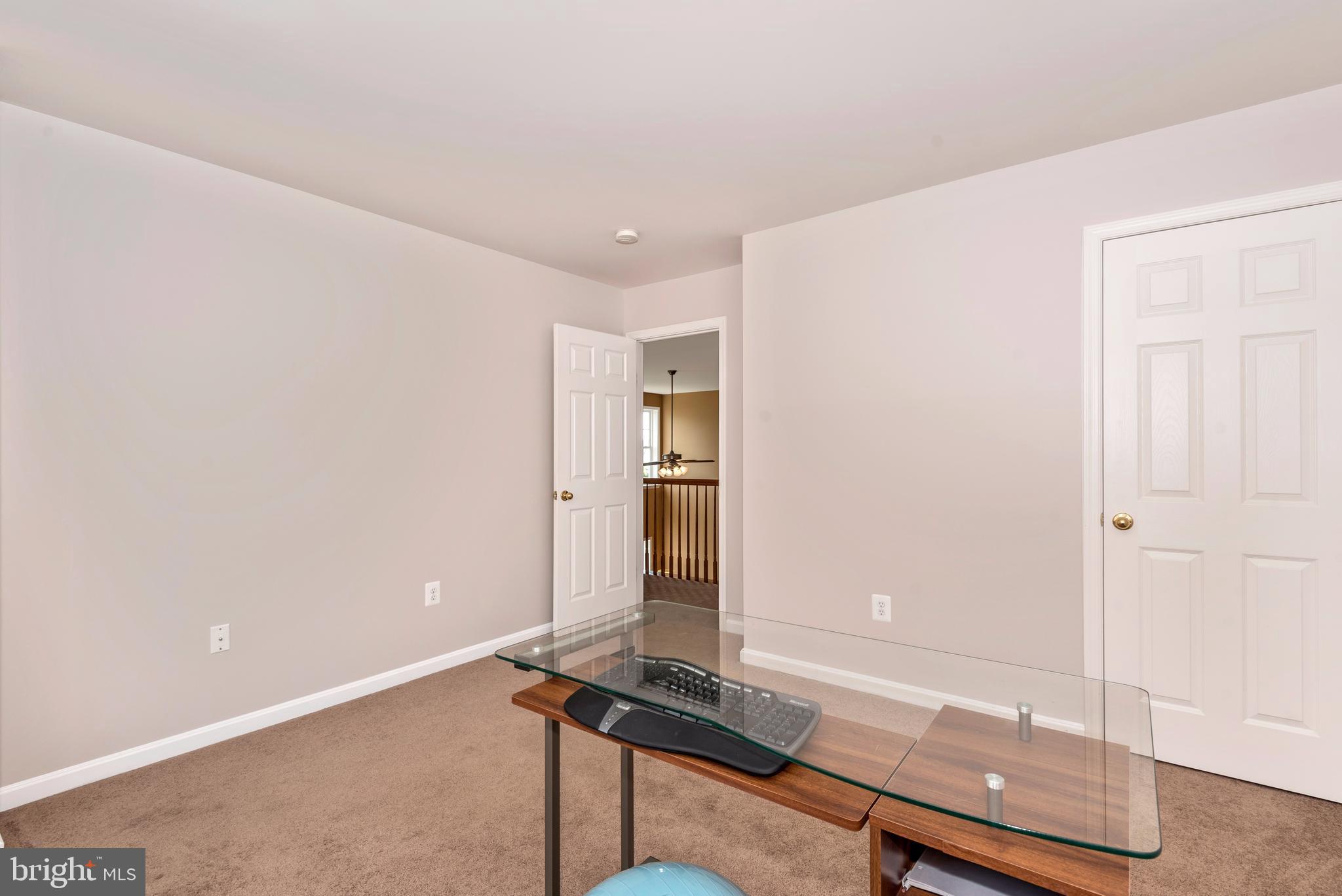 1713 Canal Run Drive Point of Rocks, MD 21777 - Photo 28 of 38 a room with furniture and wooden floor