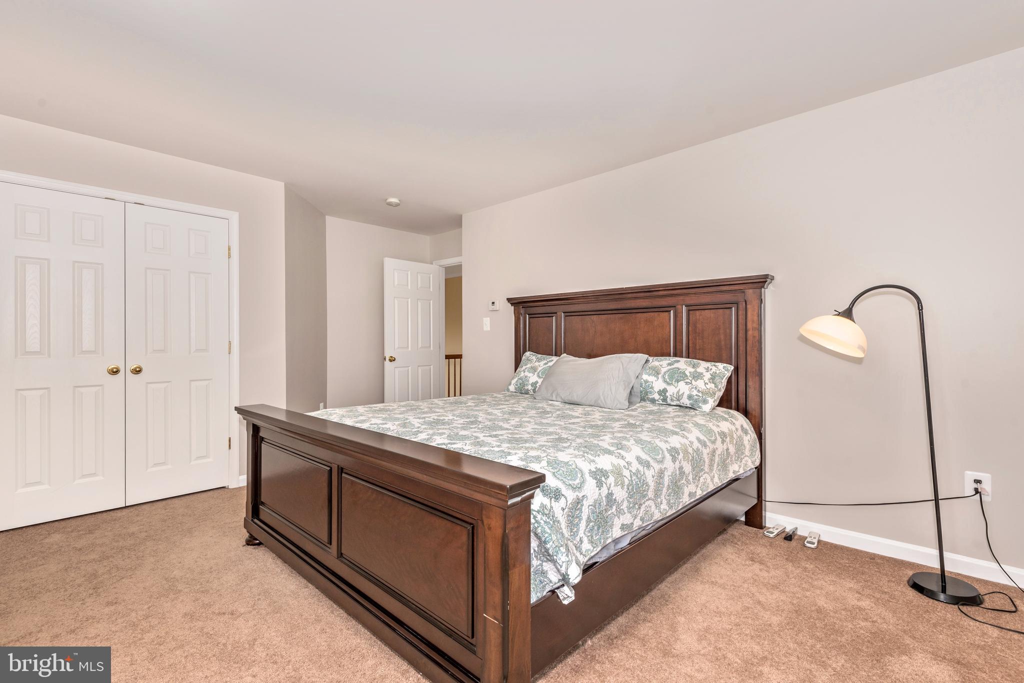 1713 Canal Run Drive Point of Rocks, MD 21777 - Photo 31 of 38 a bedroom with a bed and a dresser
