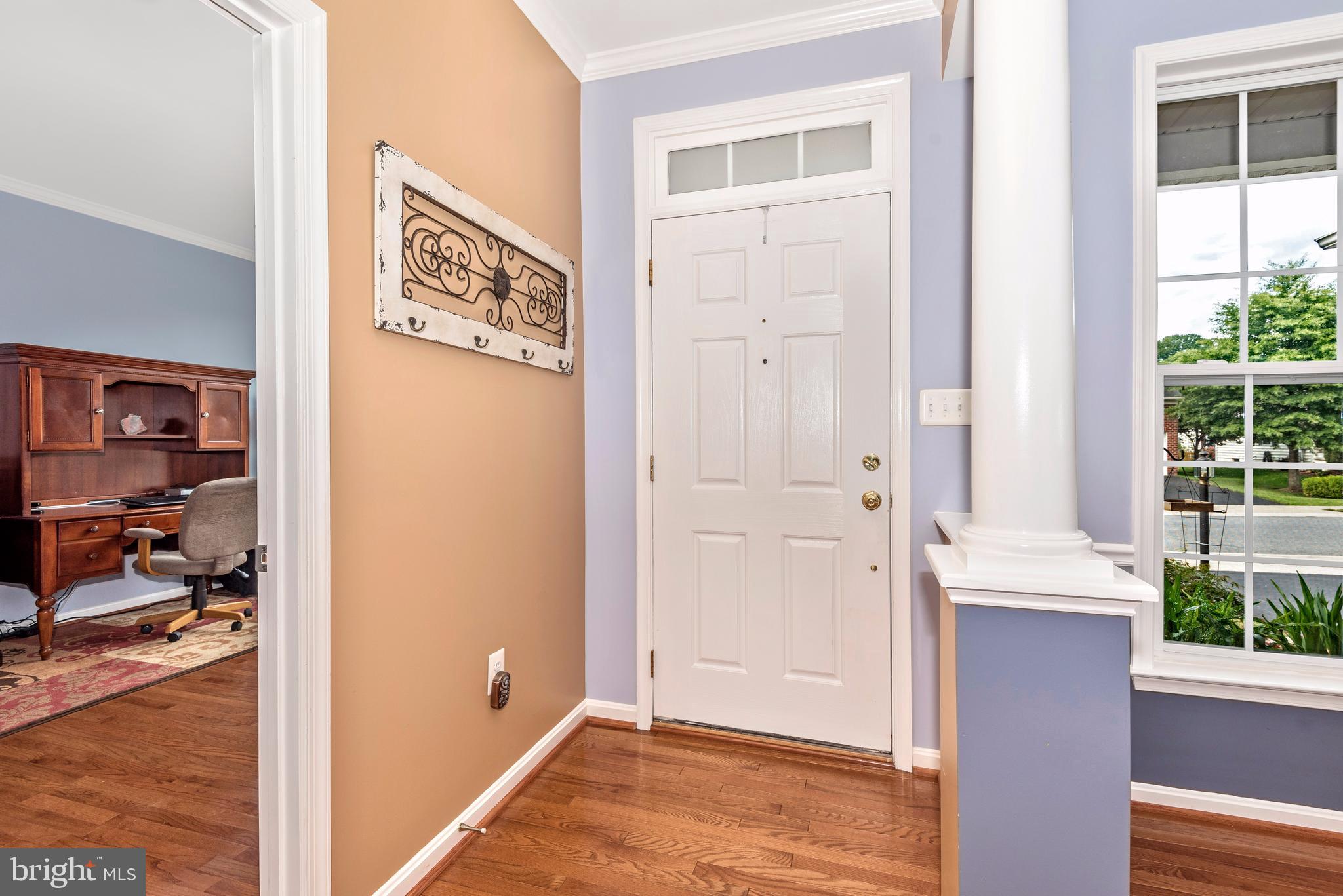 1713 Canal Run Drive Point of Rocks, MD 21777 - Photo 5 of 38 a view of a hallway with wooden floor and windows
