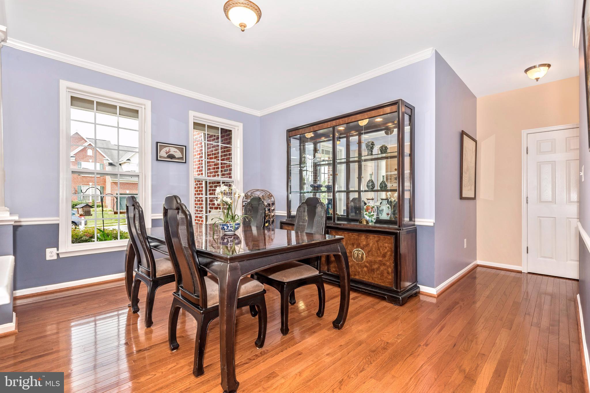 1713 Canal Run Drive Point of Rocks, MD 21777 - Photo 7 of 38 a view of a dining room with furniture window and wooden floor