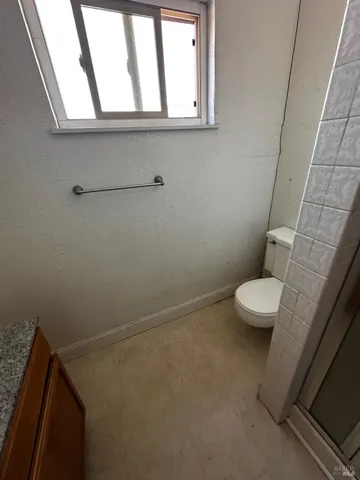 a bathroom with a toilet