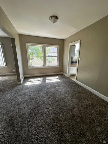 a view of empty room with front door
