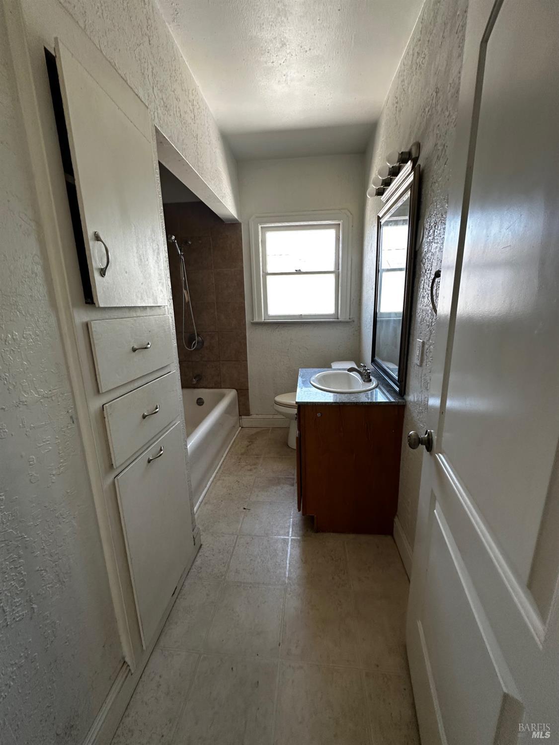 2015 Tennessee Street Vallejo, CA 94590 - Photo 9 of 29 a view of a hallway with washer and dryer