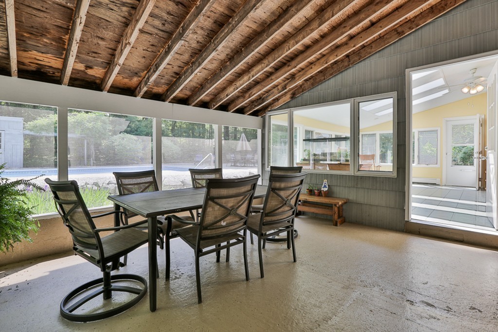 101 Chestnut Road Tyngsborough, MA 01879 - Photo 11 of 26 a view of a dining room with furniture window and outside view