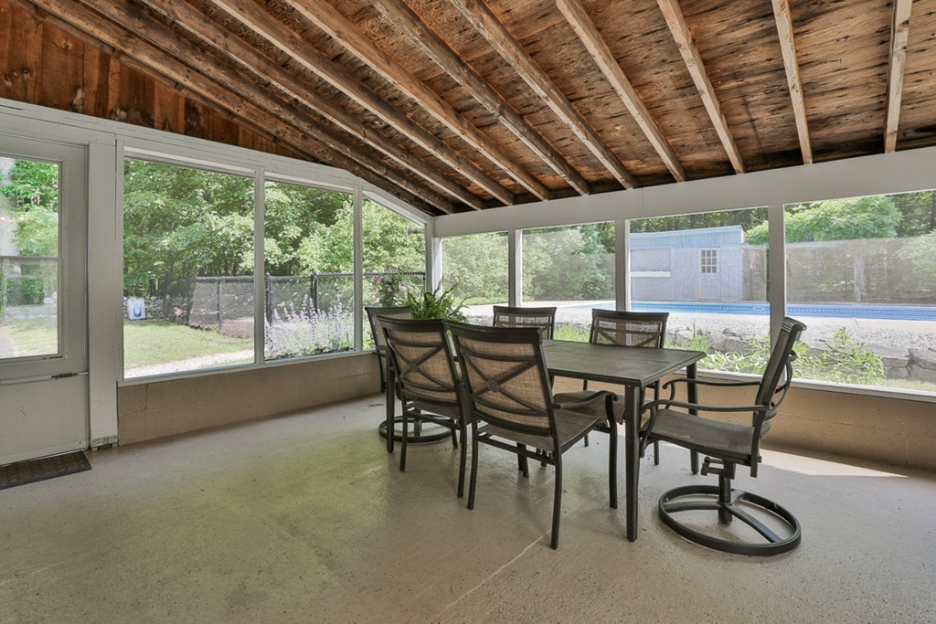 101 Chestnut Road Tyngsborough, MA 01879 - Photo 22 of 26 a view of a dining room with furniture window and outside view