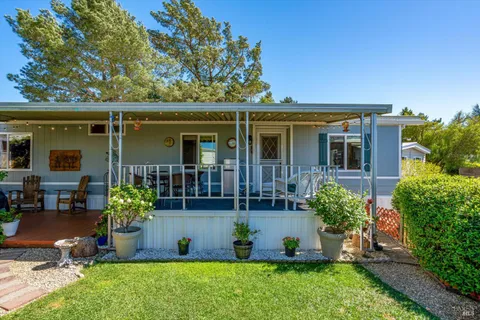 front view of a house with a big yard