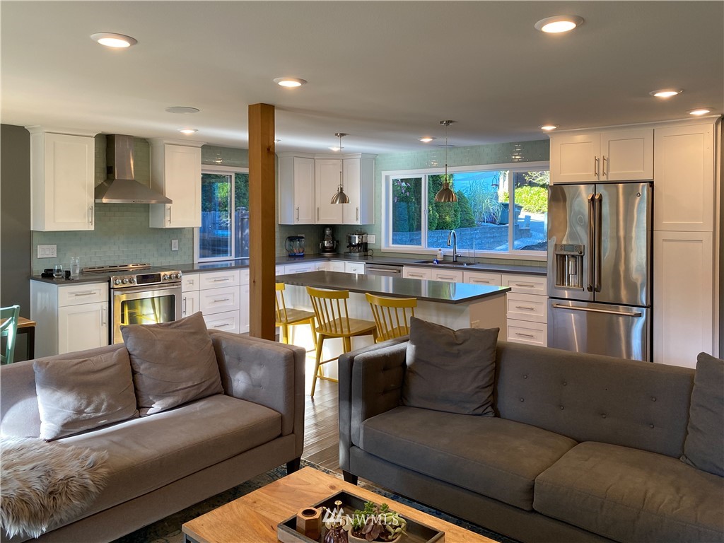 21904 1st Place West Bothell, WA 98021 - Photo 17 of 35 a living room with furniture and kitchen view