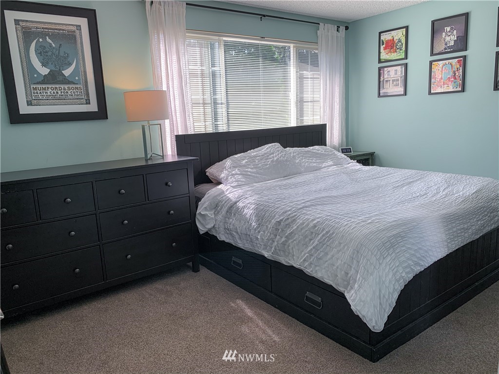 21904 1st Place West Bothell, WA 98021 - Photo 22 of 35 a bedroom with a bed and a window