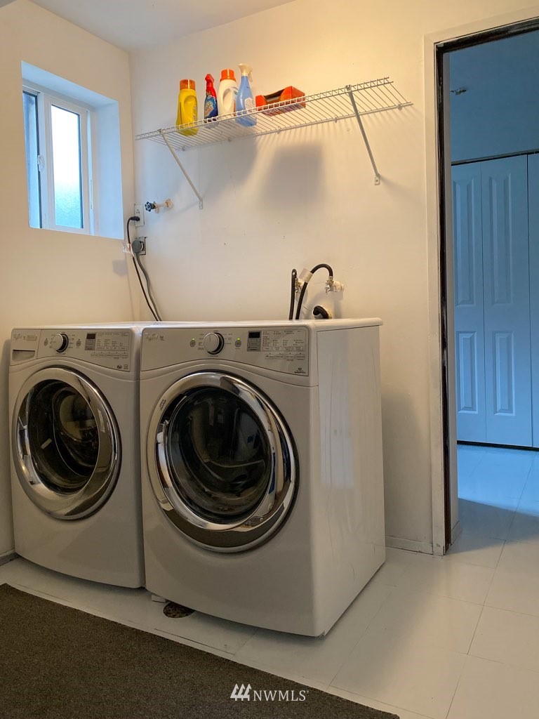 21904 1st Place West Bothell, WA 98021 - Photo 31 of 35 a utility room with dryer and washer