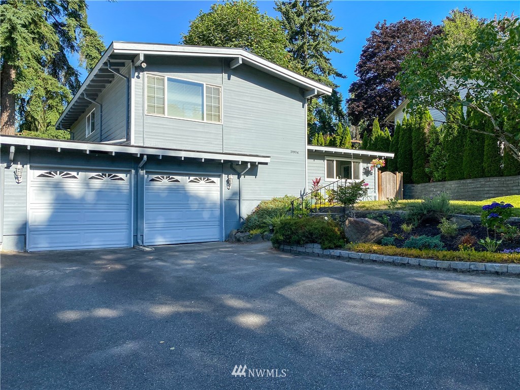 21904 1st Place West Bothell, WA 98021 - Photo 35 of 35 a view of a house with a garden