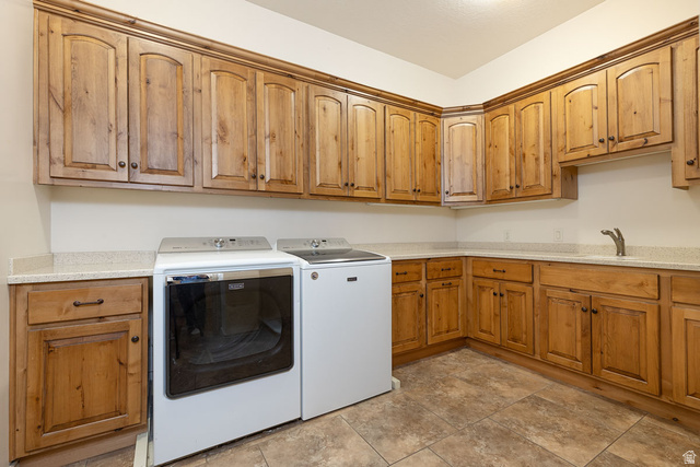 888 East Fiddlers Canyon Road Cedar City, UT 84721 - Photo 38 of 74 Laundry area featuring washer and clothes dryer and cabinet space