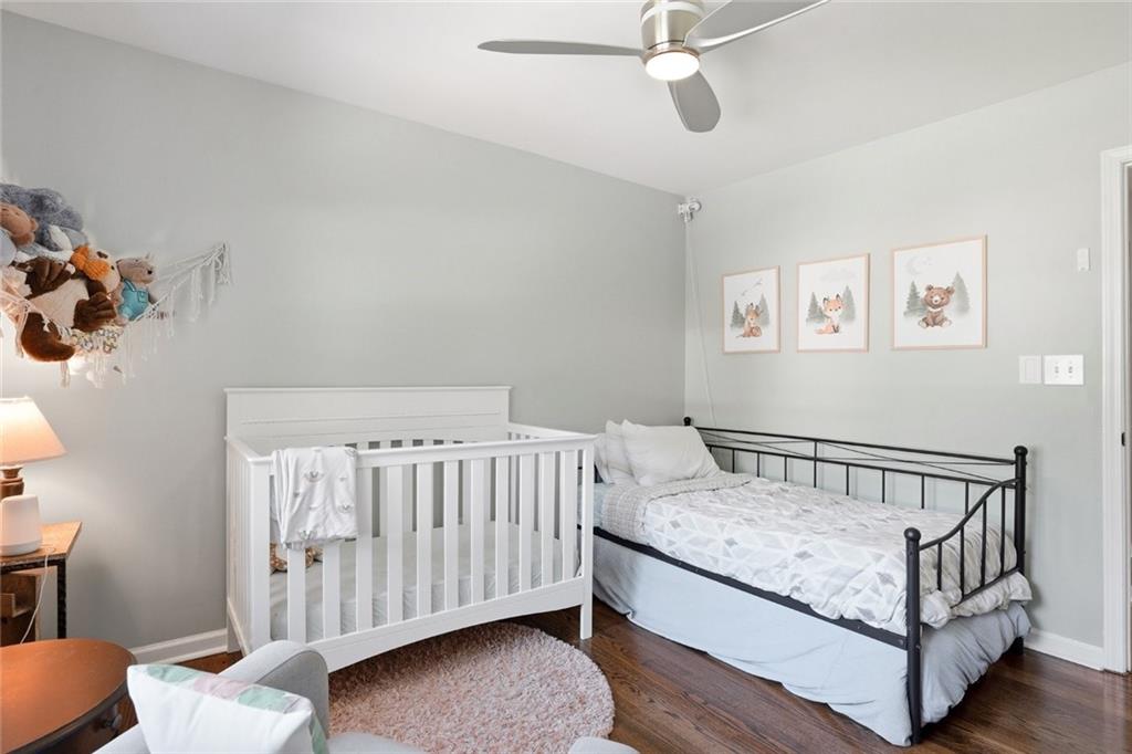 1430 Thomas Road Decatur, GA 30030 - Photo 23 of 42 a view of bedroom with furniture and wooden floor