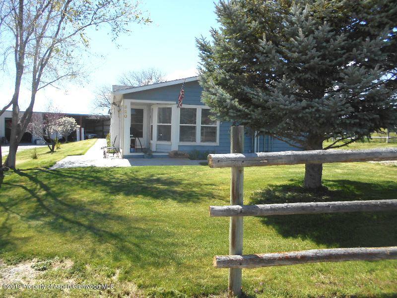 520 Lariat Road Silt, CO 81652 - Photo 1 of 30 a house with swimming pool