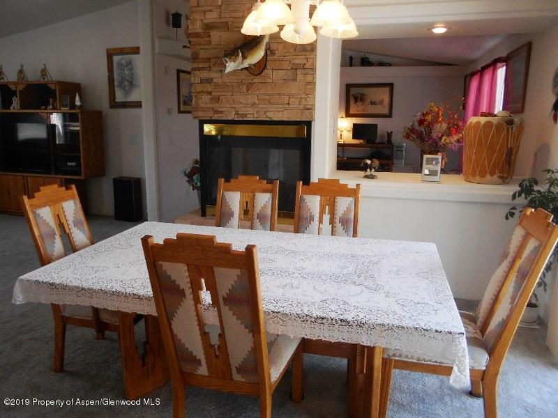 520 Lariat Road Silt, CO 81652 - Photo 18 of 30 a view of a dining room with furniture