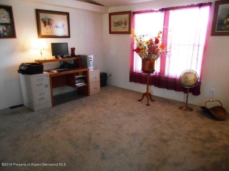 520 Lariat Road Silt, CO 81652 - Photo 21 of 30 a workspace with furniture and window
