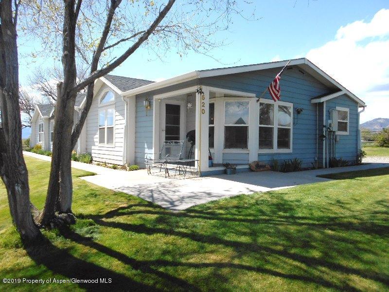 520 Lariat Road Silt, CO 81652 - Photo 4 of 30 a view of a house with yard and tree s