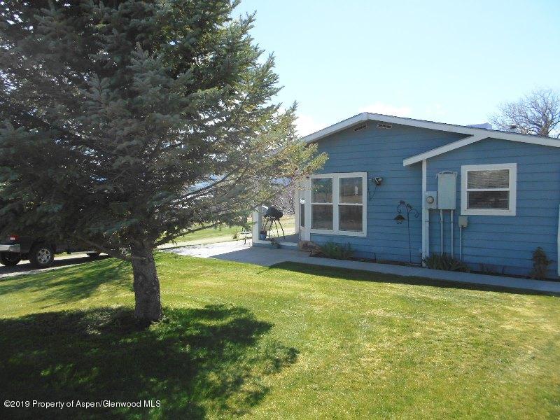 520 Lariat Road Silt, CO 81652 - Photo 5 of 30 a view of a house with swimming pool and porch
