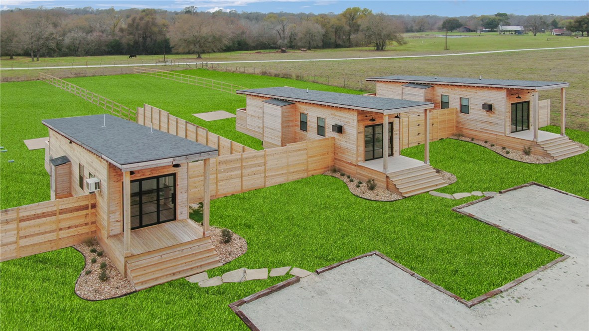 23900 Old Highway 6, Unit A Navasota, TX 77868 - Photo 1 of 1 an aerial view of a house with garden
