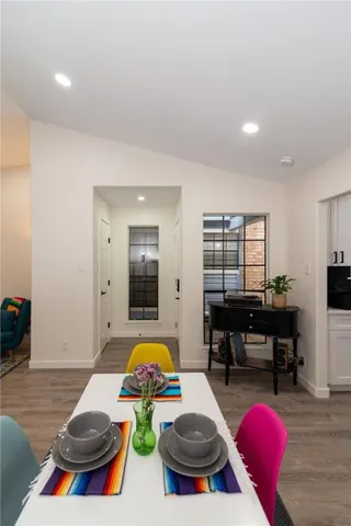 a room with furniture and wooden floor