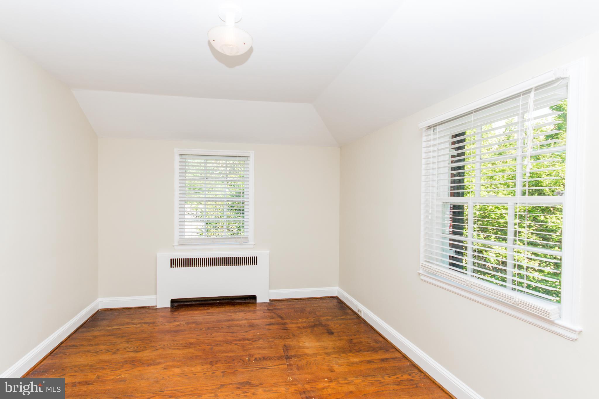 5001 Broadmoor Road Baltimore, MD 21212 - Photo 17 of 26 a view of an empty room with a window