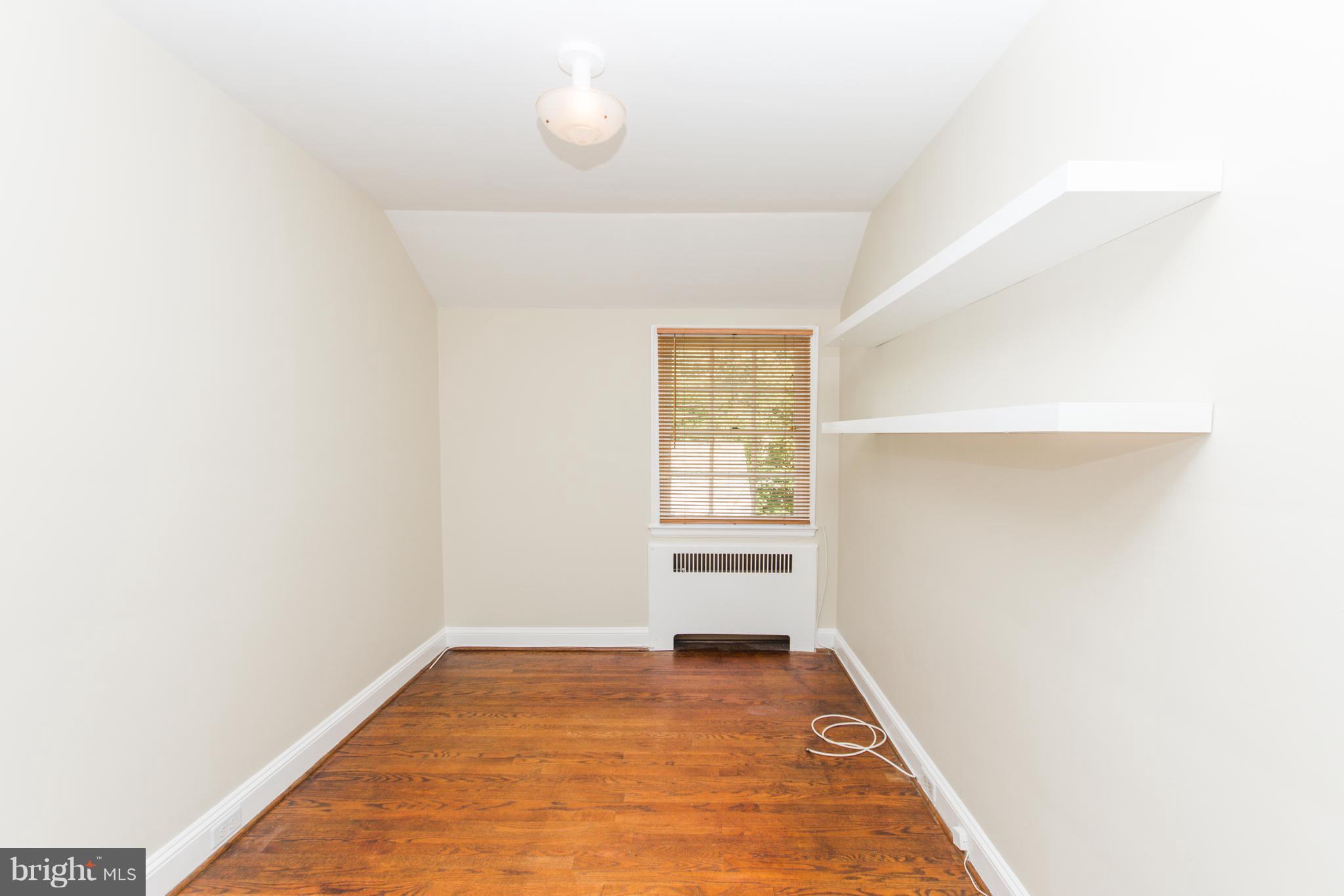 5001 Broadmoor Road Baltimore, MD 21212 - Photo 18 of 26 a view of an empty room and window