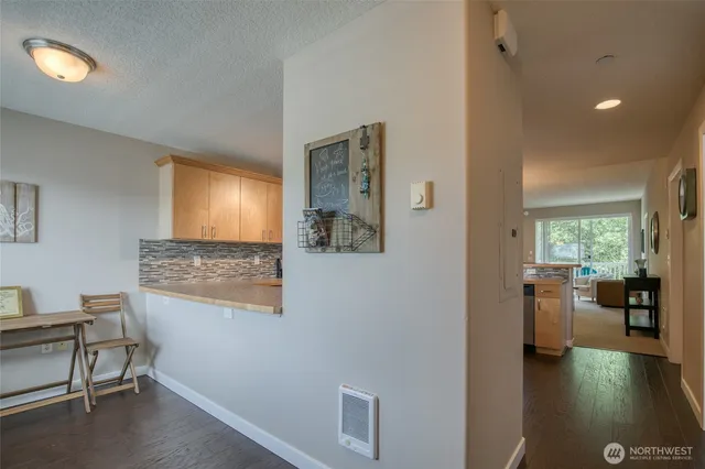 a view of a workspace with furniture and a livingroom