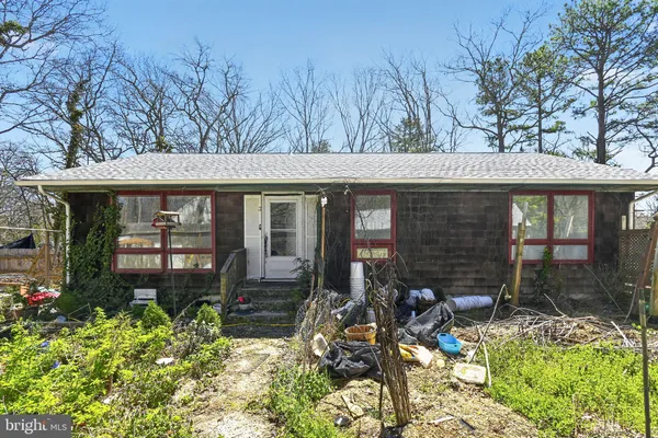 front view of a house with a patio