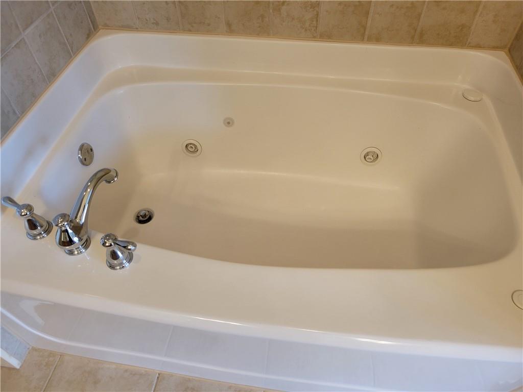 2098 Silas Way Northwest Atlanta, GA 30318 - Photo 14 of 18 a bathroom with a bathtub