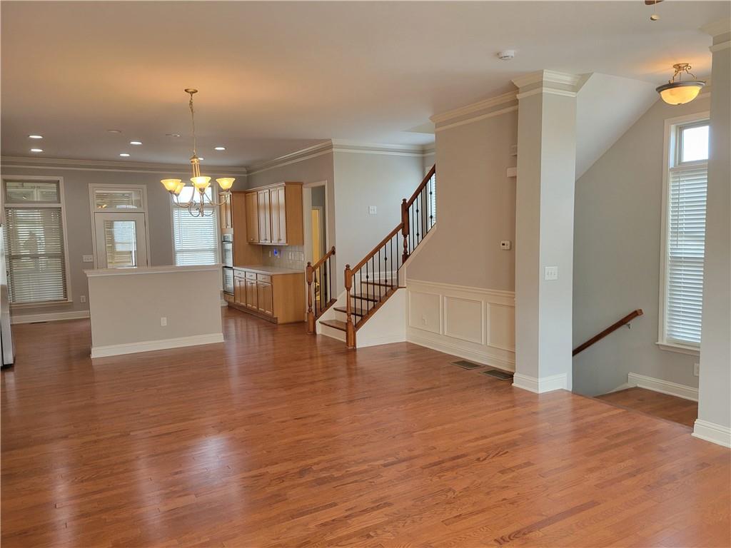 2098 Silas Way Northwest Atlanta, GA 30318 - Photo 8 of 18 a view of entryway and hall with wooden floor