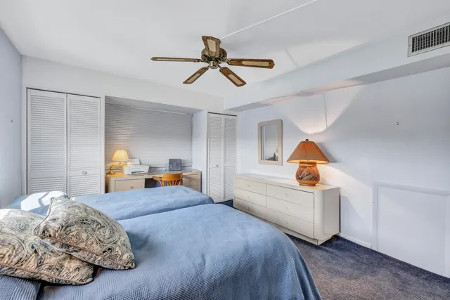 a bedroom with furniture and window