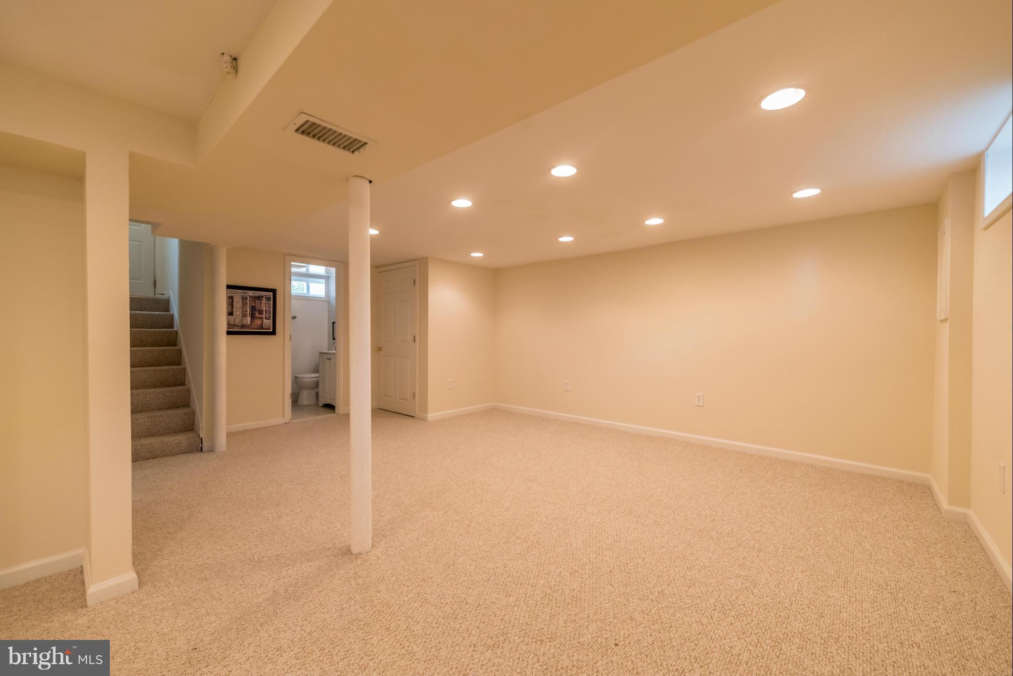 4106 Sampson Road Silver Spring, MD 20906 - Photo 21 of 30 an empty room with a kitchen
