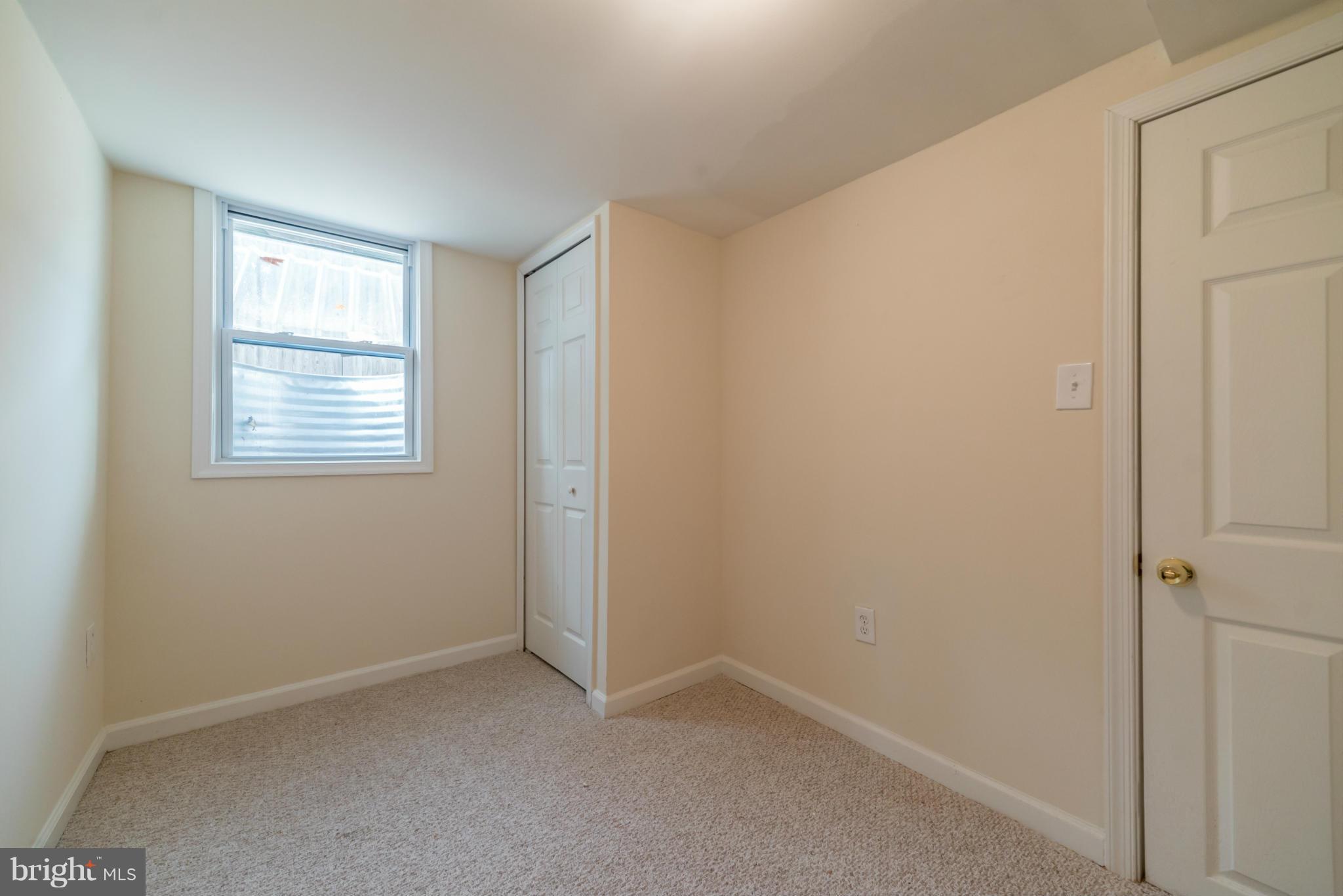4106 Sampson Road Silver Spring, MD 20906 - Photo 25 of 30 a view of an empty room with a window