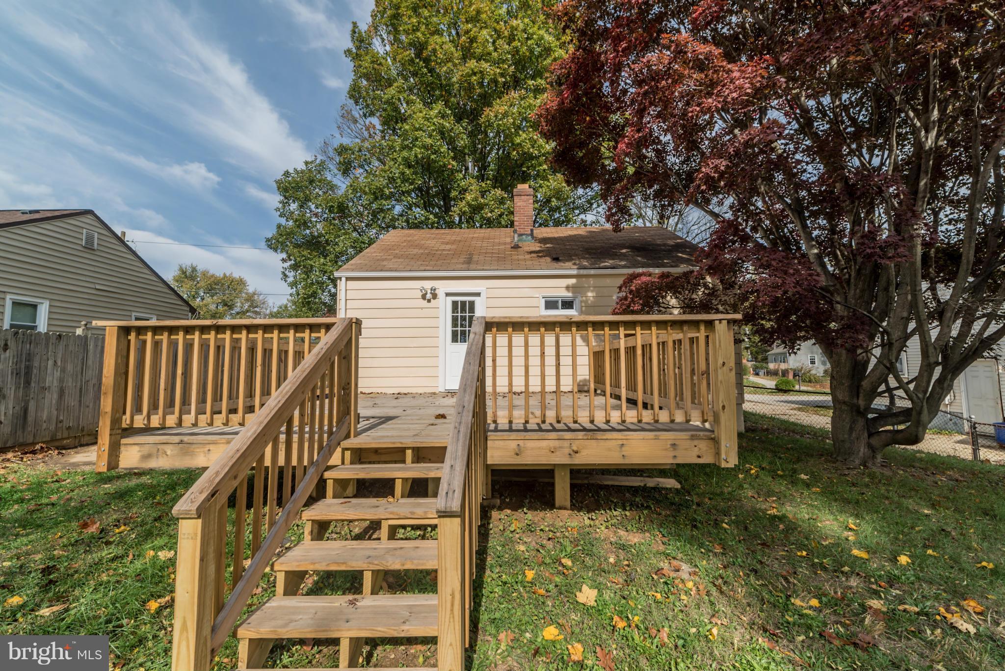 4106 Sampson Road Silver Spring, MD 20906 - Photo 29 of 30 a view of a deck with a yard