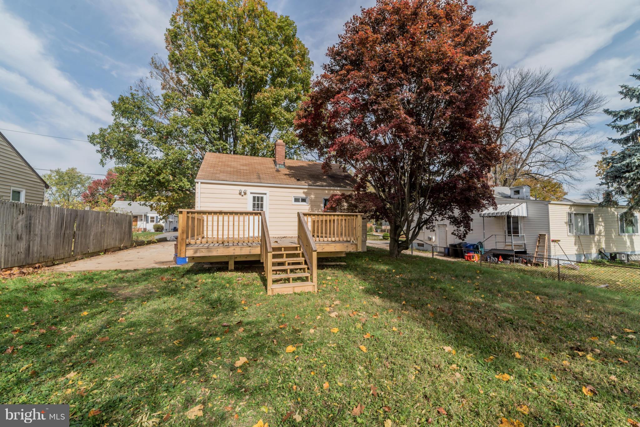 4106 Sampson Road Silver Spring, MD 20906 - Photo 30 of 30 a backyard of a house with table and chairs