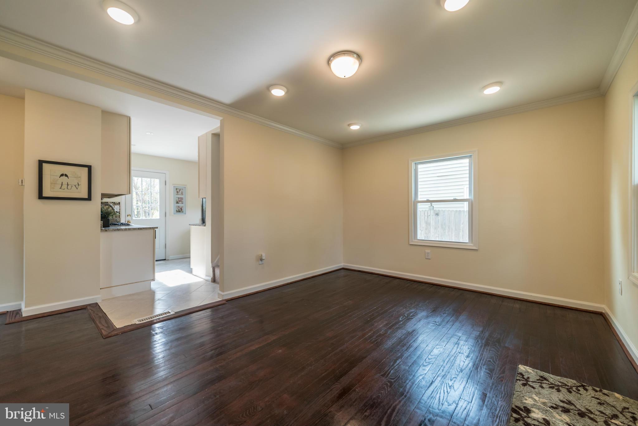 4106 Sampson Road Silver Spring, MD 20906 - Photo 9 of 30 a view of empty room with wooden floor