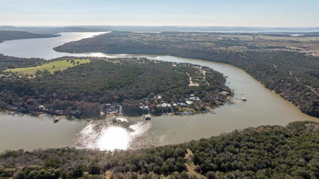 9037 Lacy Road Graford, TX 76449 - Photo 24 of 36 a view of lake and mountain