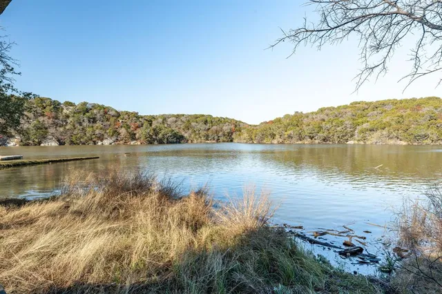 a view of a lake with a mountain in the background
