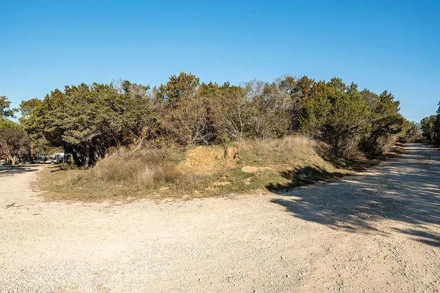 a view of yard covered with snow