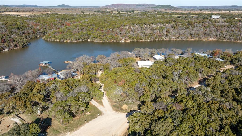 9037 Lacy Road Graford, TX 76449 - Photo 36 of 36 an aerial view of a residential houses with lake view