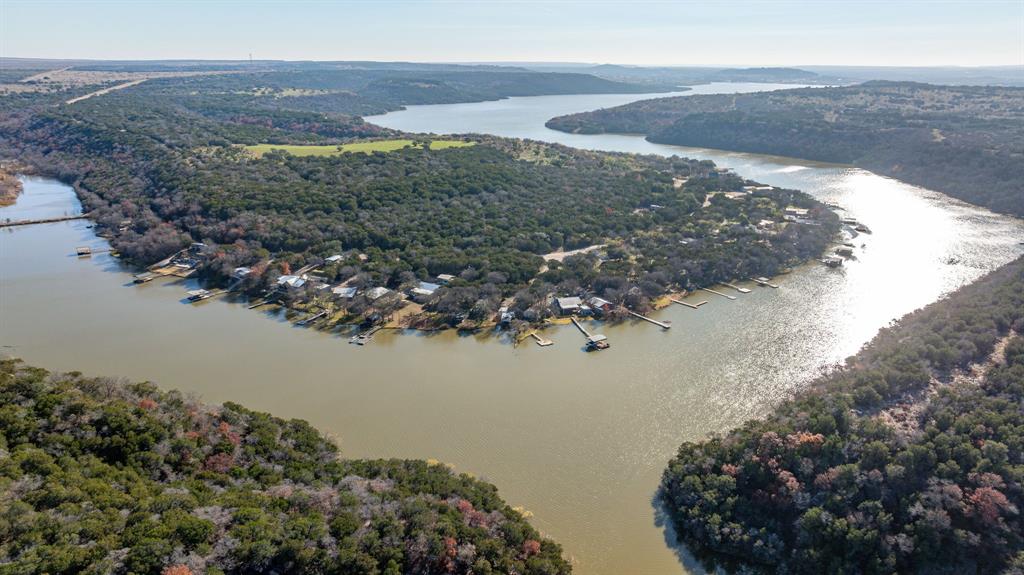 9037 Lacy Road Graford, TX 76449 - Photo 10 of 36 a view of lake with mountain