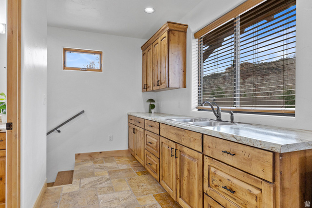 98 Bridge Road Rockville, UT 84763 - Photo 31 of 75 2nd Floor – Bedroom #4 with Wet Bar. Laundry room featuring light stone finish flooring and recessed lighting